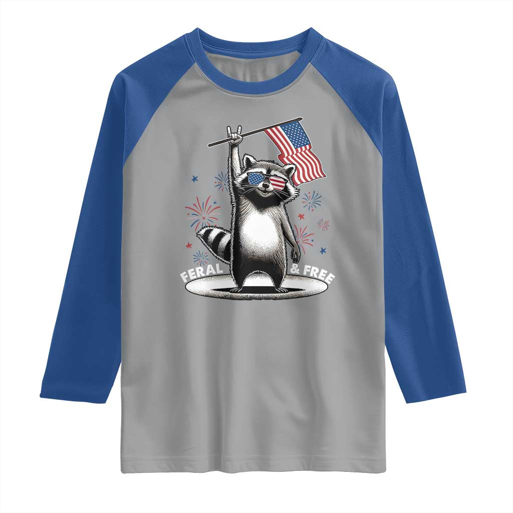 Funny Feral And Free Raglan Shirt 4th of July Patriotic Raccoon With American Flag Fireworks - Wonder Print Shop