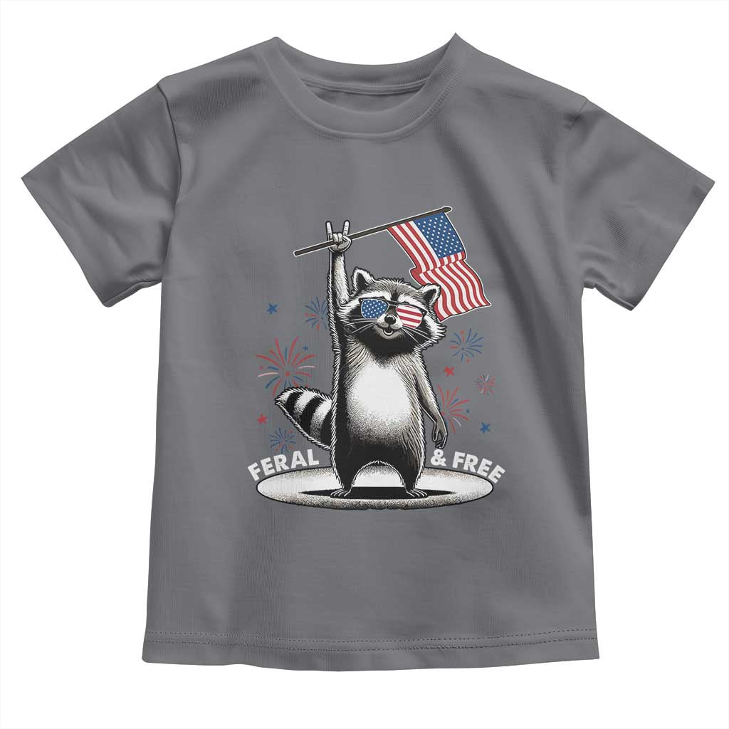 Funny Feral And Free Toddler T Shirt 4th of July Patriotic Raccoon With American Flag Fireworks - Wonder Print Shop