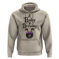 Funny Halloween Pregnancy Announcement Hoodie A Baby Is Brewing Witch Cauldron Footprint Pregnant Baby - Wonder Print Shop