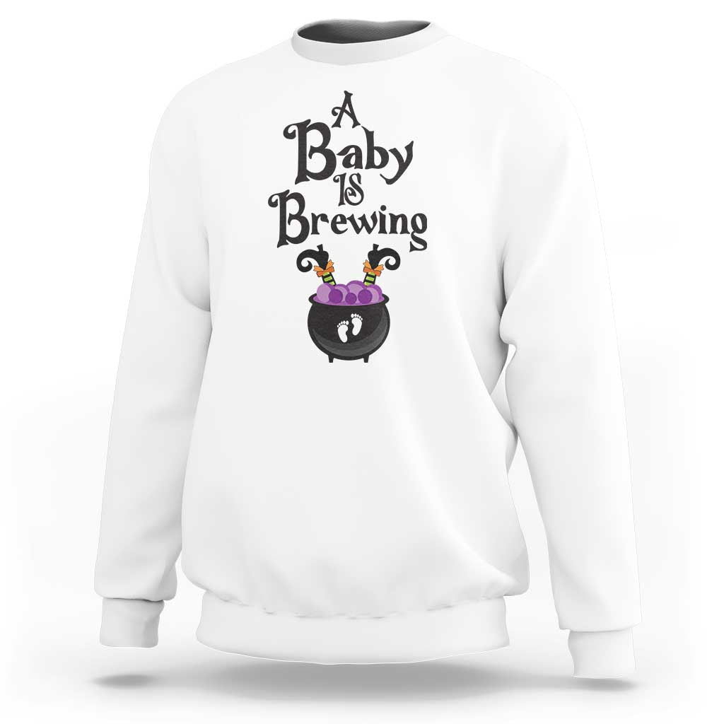 Funny Halloween Pregnancy Announcement Sweatshirt A Baby Is Brewing Witch Cauldron Footprint Pregnant Baby - Wonder Print Shop