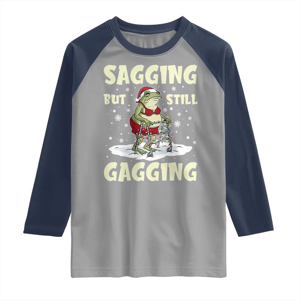 Funny Sagging But Still Gagging Christmas Frog Raglan Shirt Funny Cringe Meme Gag Humor - Wonder Print Shop