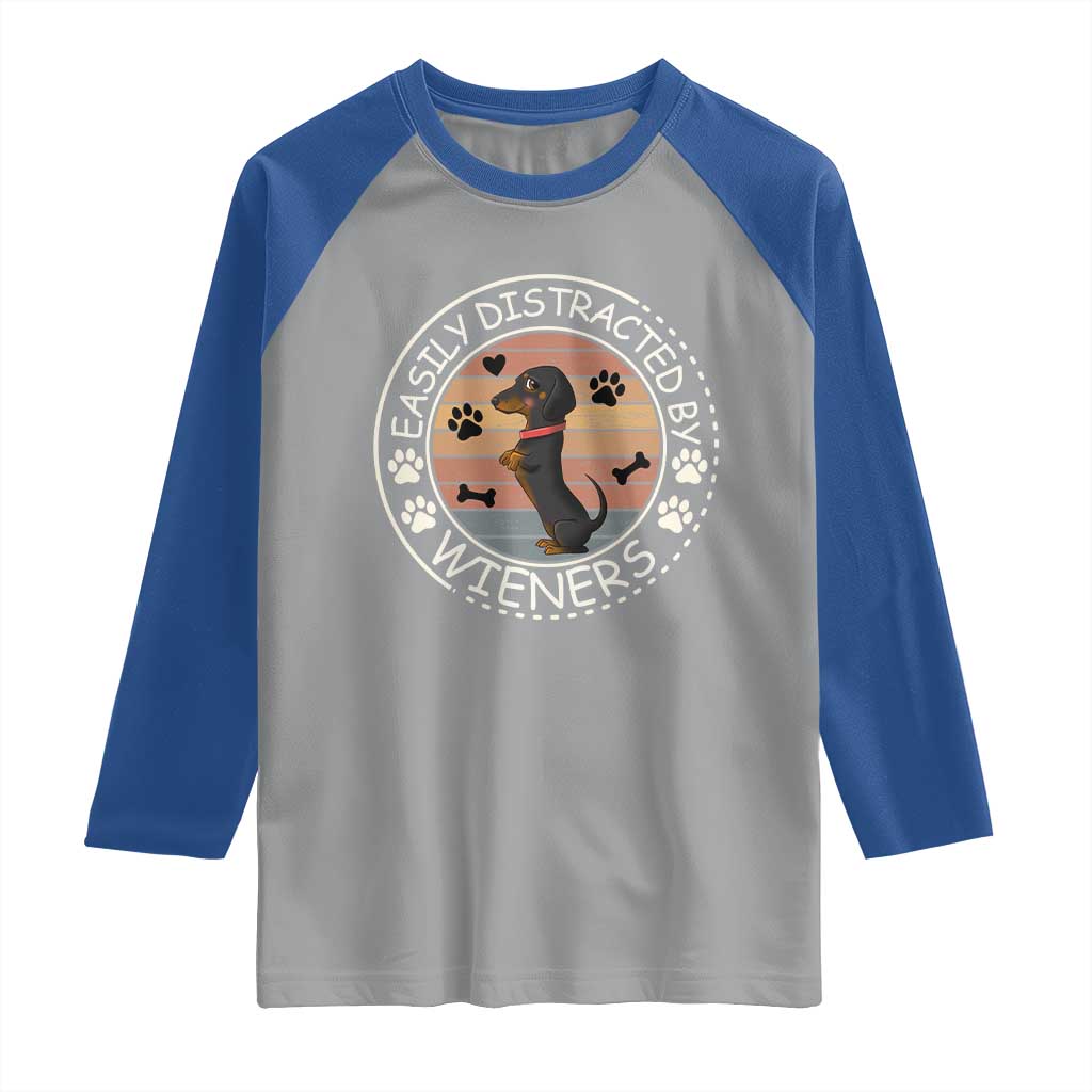 Easily Distracted By Wieners Raglan Shirt Dachshund Dog Lover Retro Sunset - Wonder Print Shop