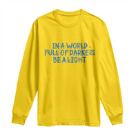 In A World Full Of Darkness Be A Light Long Sleeve Shirt Christmas Quote Gift - Wonder Print Shop