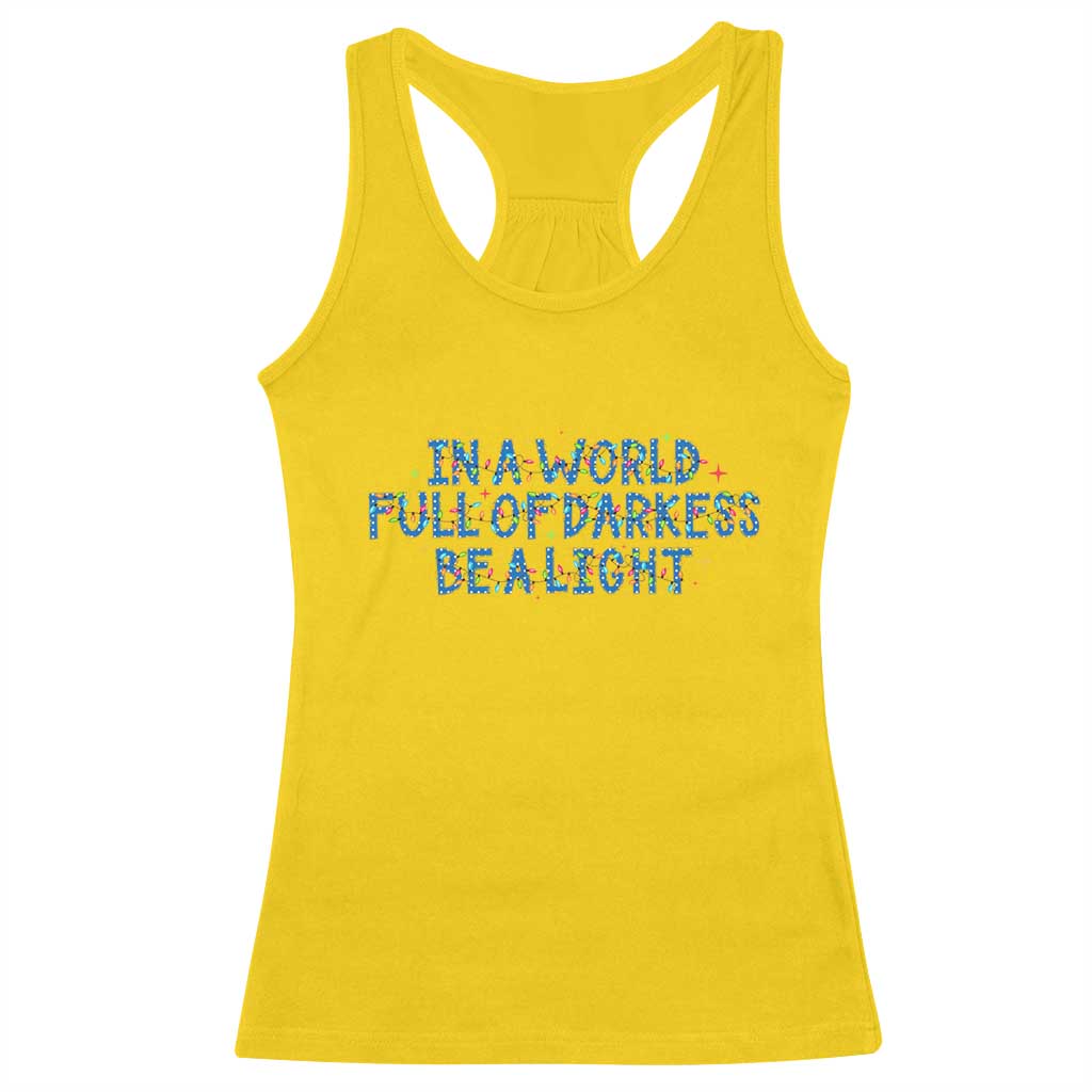 In A World Full Of Darkness Be A Light Racerback Tank Top Christmas Quote Gift - Wonder Print Shop