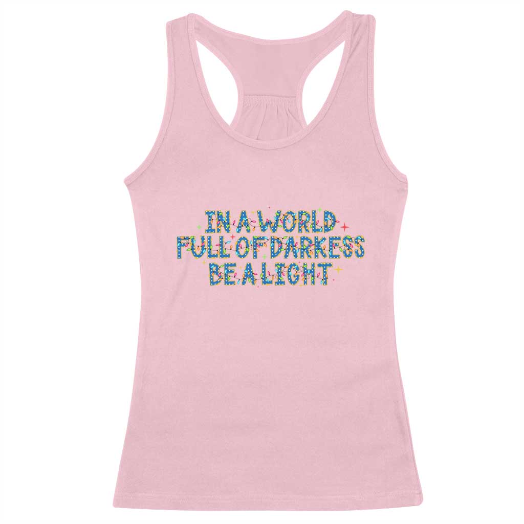 In A World Full Of Darkness Be A Light Racerback Tank Top Christmas Quote Gift - Wonder Print Shop
