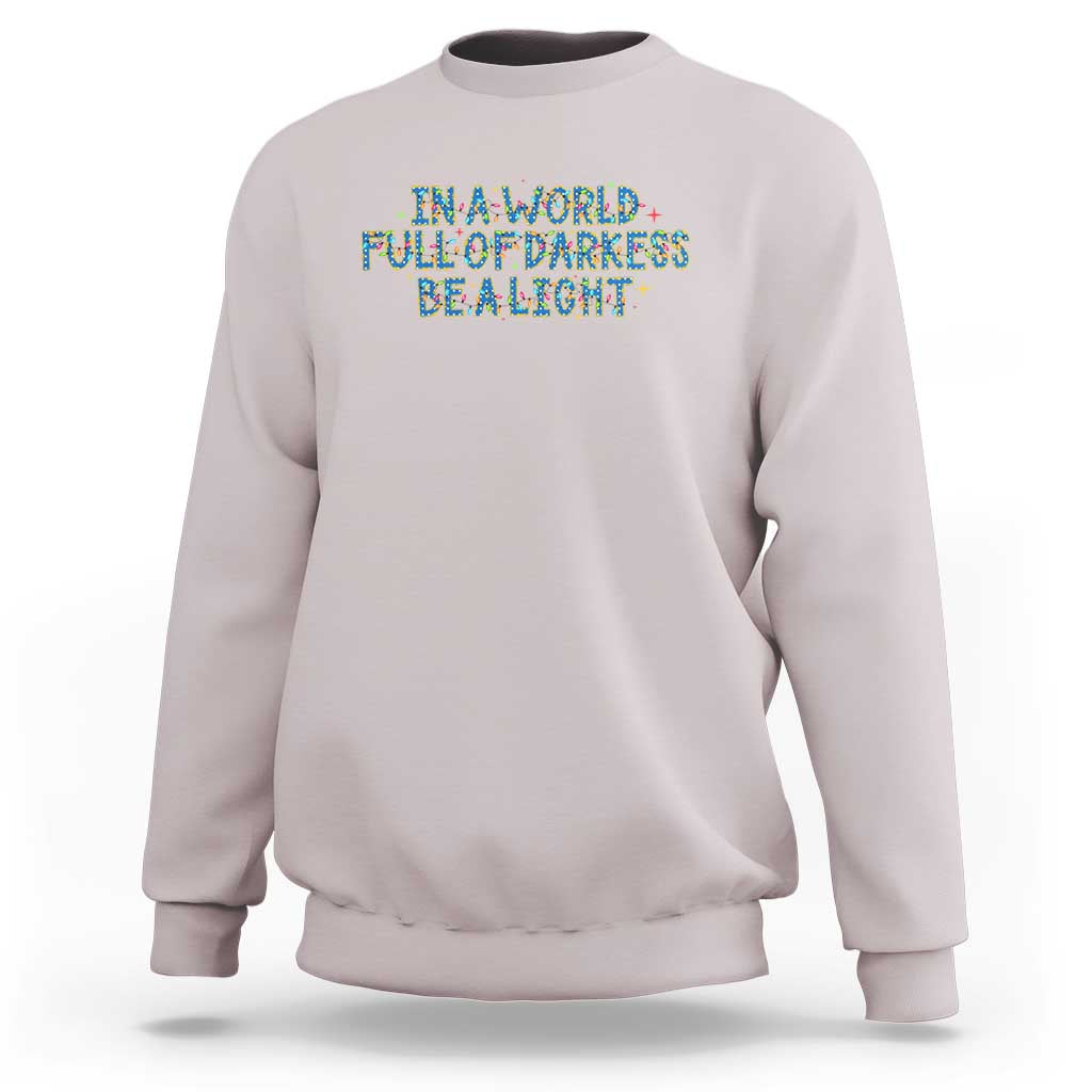 In A World Full Of Darkness Be A Light Sweatshirt Christmas Quote Gift - Wonder Print Shop