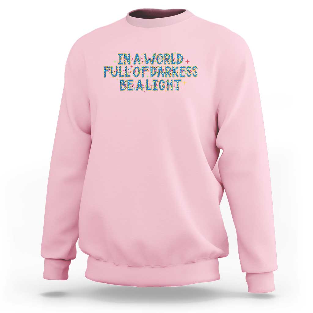In A World Full Of Darkness Be A Light Sweatshirt Christmas Quote Gift - Wonder Print Shop