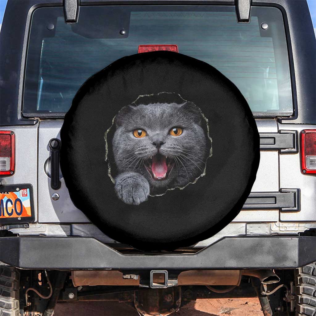 Cute British Shorthair Cat Peeking Through Cracked Wall Spare Tire Cover