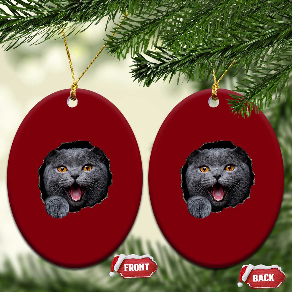 Cute British Shorthair Cat Peeking Through Cracked Wall Ceramic Ornament