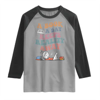 A Book A Day Keeps Reality Away Raglan Shirt Cute Girl Book Lover - Wonder Print Shop