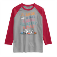 A Book A Day Keeps Reality Away Raglan Shirt Cute Girl Book Lover - Wonder Print Shop