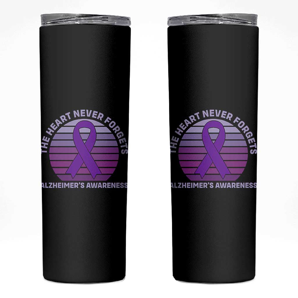 The Heart Never Forgets Alzheimers Support Skinny Tumbler Vintage Sunset Purple Ribbon Graphic