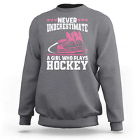 Never Underestimate A Girl Who Plays Hockey Sweatshirt Gift For Women - Wonder Print Shop