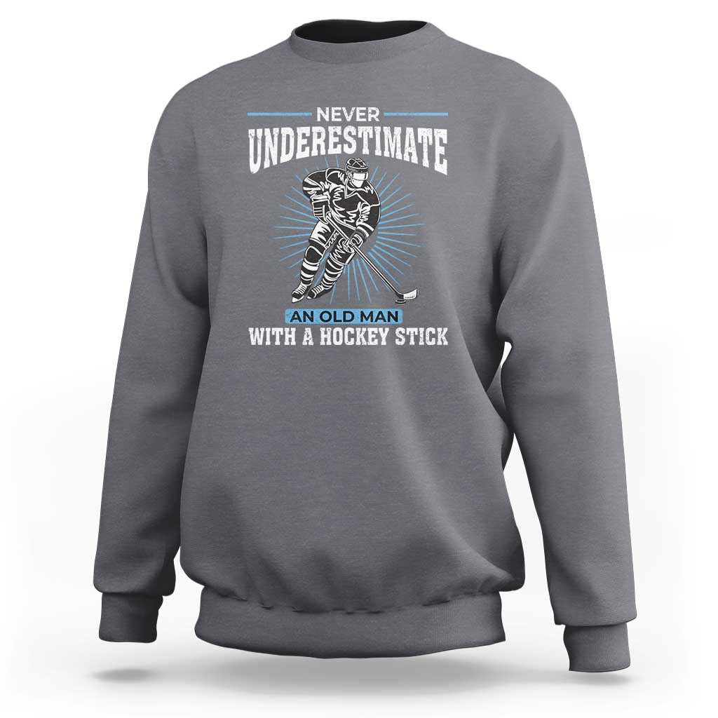 Never Underestimate An Old Man With A Hockey Stick Sweatshirt Ice Hockey Gift - Wonder Print Shop