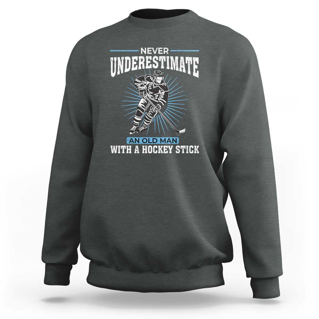 Never Underestimate An Old Man With A Hockey Stick Sweatshirt Ice Hockey Gift - Wonder Print Shop