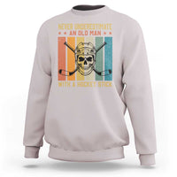 Retro Ice Hockey Player Sweatshirt Funny Never Underestimate An Old Man - Wonder Print Shop
