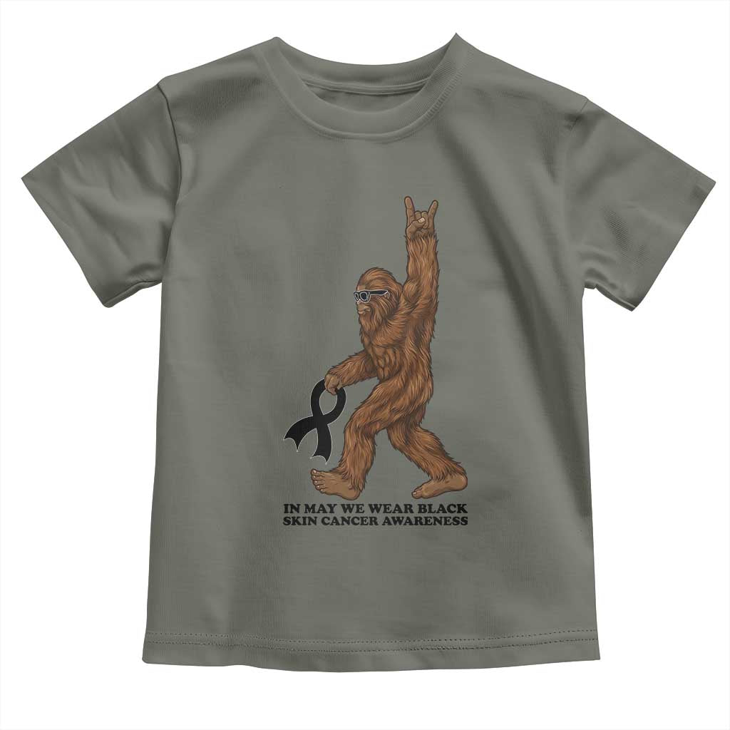 Funny Bigfoot Skin Cancer Support Toddler T Shirt In May We Wear Black