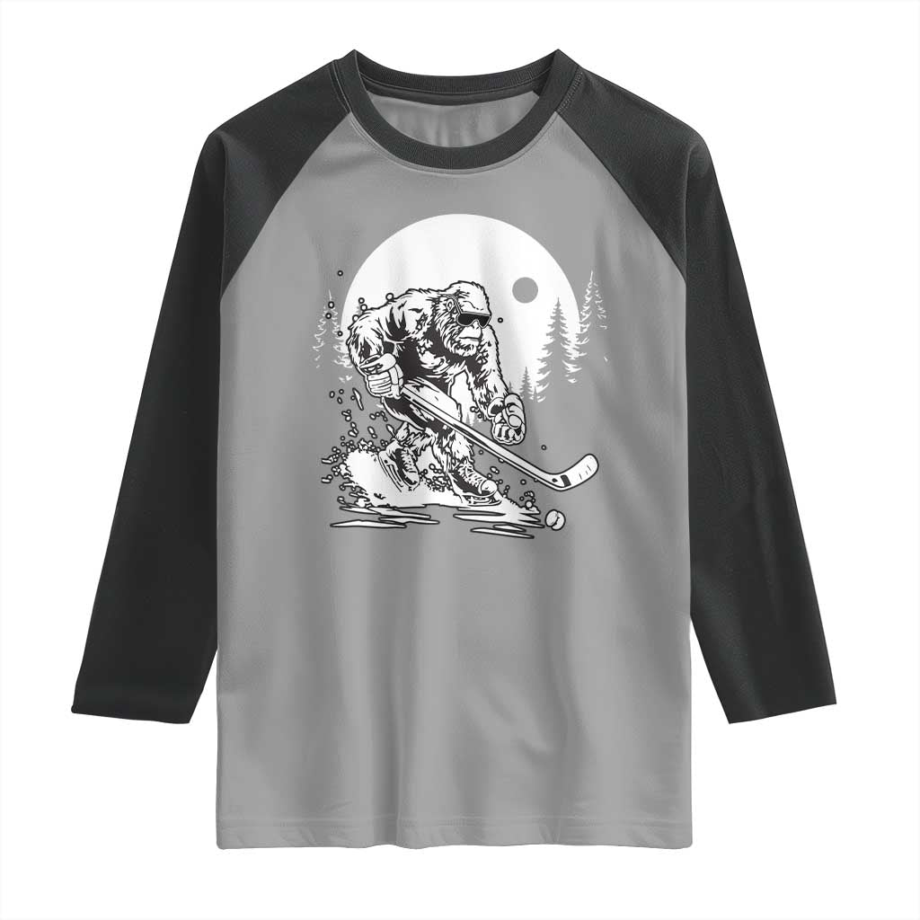 Bigfoot Playing Ice Hockey Raglan Shirt Funny Cryptid Sports Gift - Wonder Print Shop