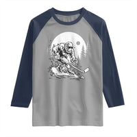 Bigfoot Playing Ice Hockey Raglan Shirt Funny Cryptid Sports Gift - Wonder Print Shop