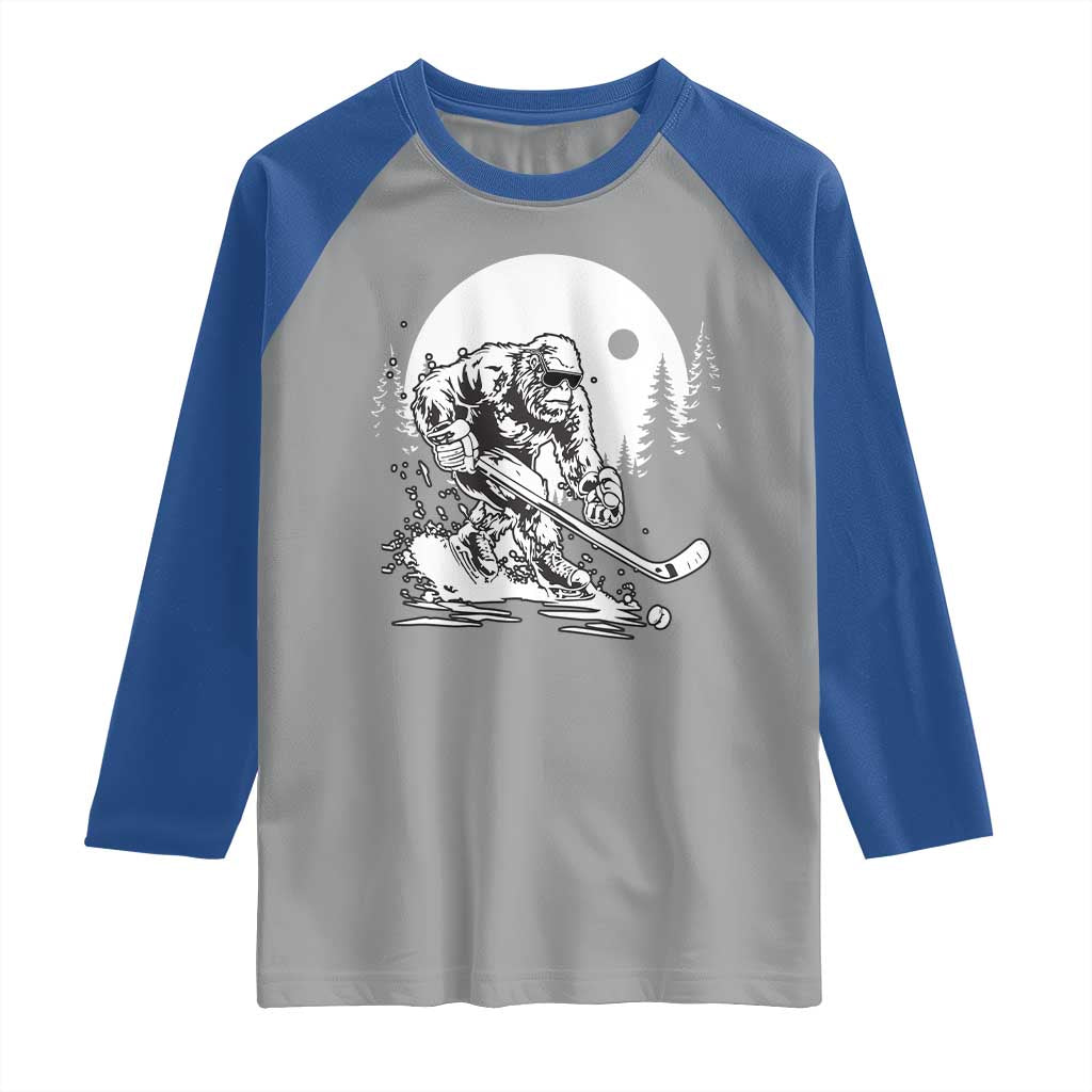 Bigfoot Playing Ice Hockey Raglan Shirt Funny Cryptid Sports Gift - Wonder Print Shop