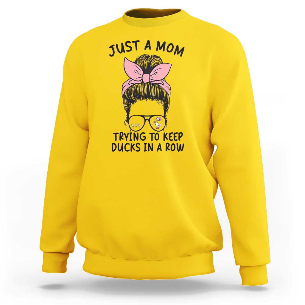 Just A Mom Trying To Keep Her Ducks In A Row Sweatshirt Funny Duck Mom Messy Hair Bun Moms Life