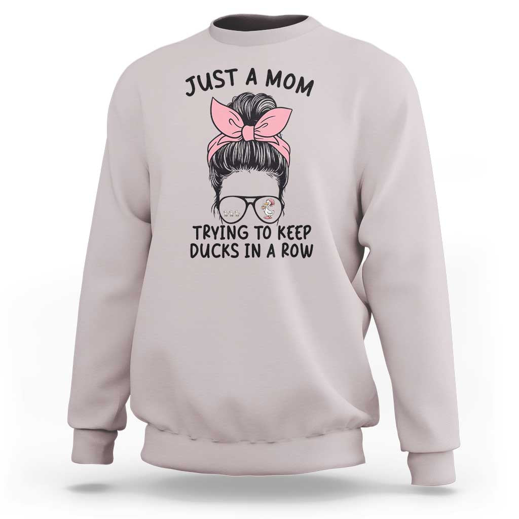 Just A Mom Trying To Keep Her Ducks In A Row Sweatshirt Funny Duck Mom Messy Hair Bun Moms Life