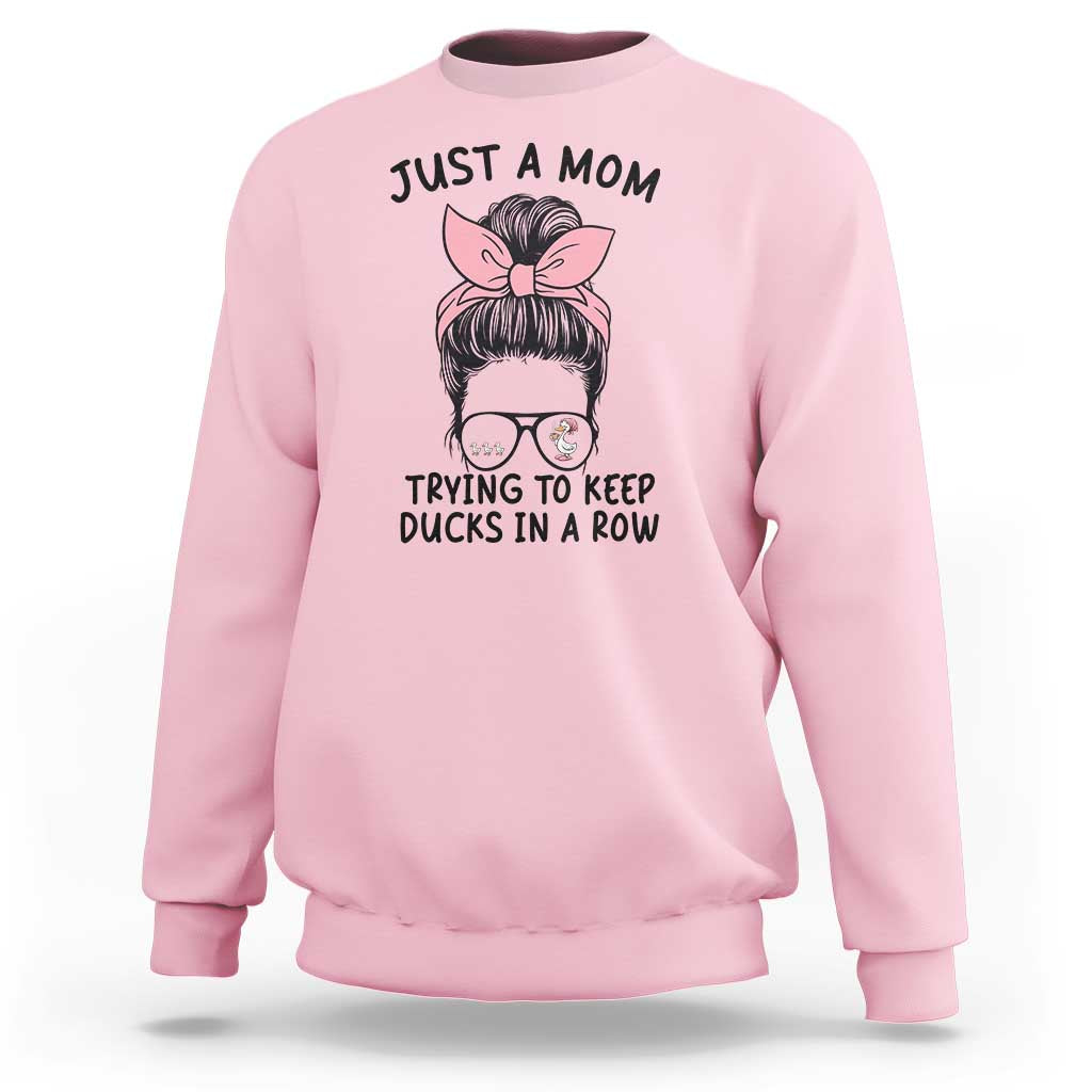 Just A Mom Trying To Keep Her Ducks In A Row Sweatshirt Funny Duck Mom Messy Hair Bun Moms Life