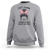 Just A Mom Trying To Keep Her Ducks In A Row Sweatshirt Funny Duck Mom Messy Hair Bun Moms Life