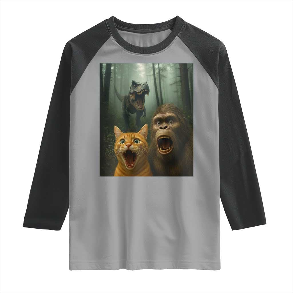 Cat Bigfoot Selfie With Dinosaur Raglan Shirt Funny Surprised Scared Sasquatch Cat - Wonder Print Shop