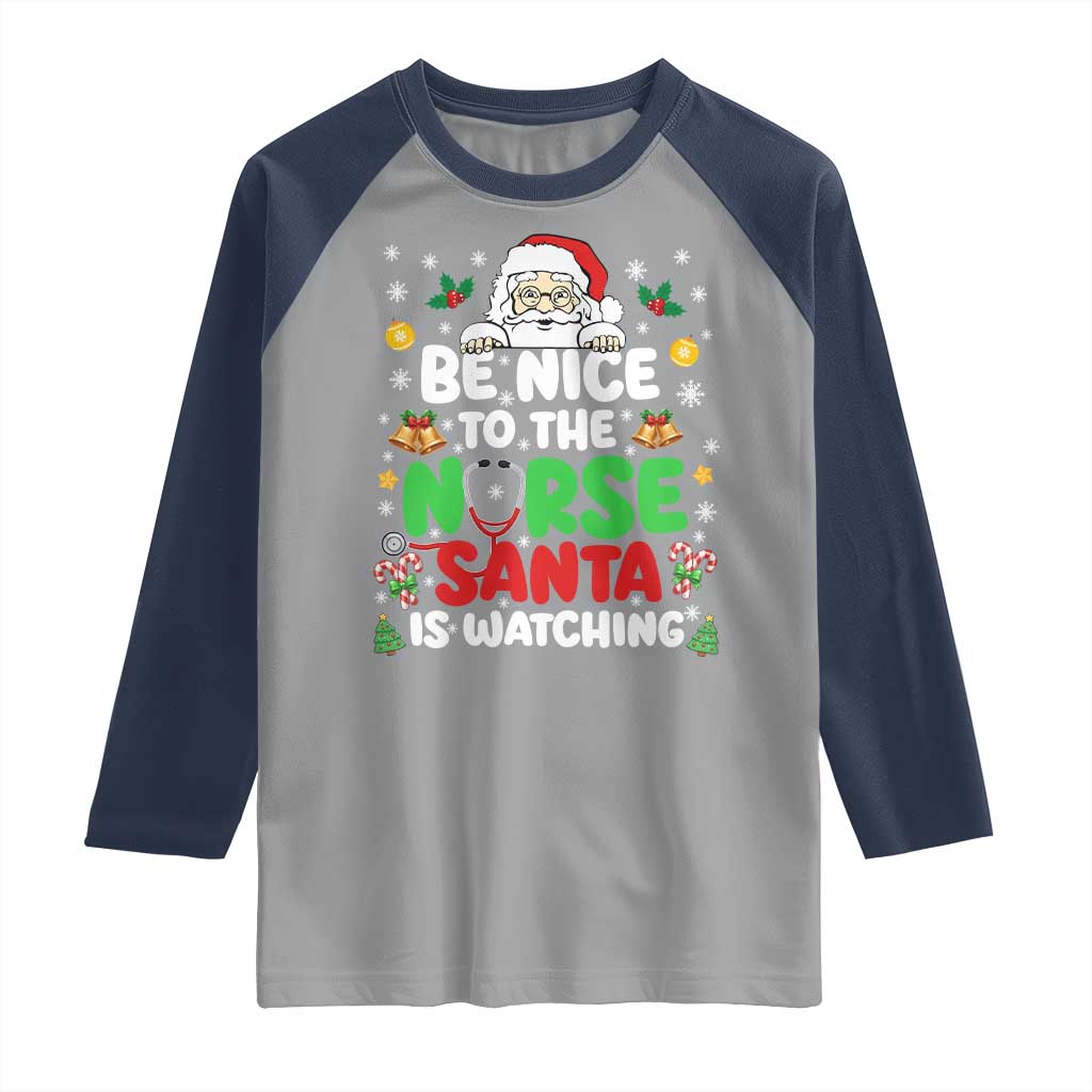 Christmas Nurse Raglan Shirt Be Nice To The Nurse Santa Is Watching - Wonder Print Shop