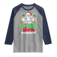 Christmas Nurse Raglan Shirt Be Nice To The Nurse Santa Is Watching - Wonder Print Shop