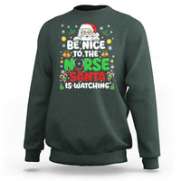 Christmas Nurse Sweatshirt Be Nice To The Nurse Santa Is Watching - Wonder Print Shop
