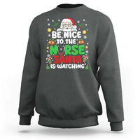 Christmas Nurse Sweatshirt Be Nice To The Nurse Santa Is Watching - Wonder Print Shop