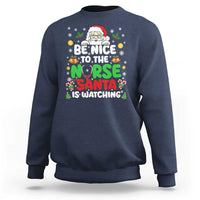 Christmas Nurse Sweatshirt Be Nice To The Nurse Santa Is Watching - Wonder Print Shop