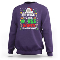 Christmas Nurse Sweatshirt Be Nice To The Nurse Santa Is Watching - Wonder Print Shop