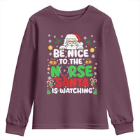 Christmas Nurse Youth Sweatshirt Be Nice To The Nurse Santa Is Watching - Wonder Print Shop