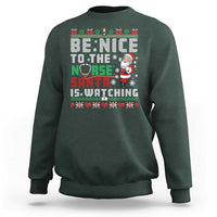 Funny Nurse Christmas Sweatshirt Be Nice To The Nurse Santa Is Watching - Wonder Print Shop