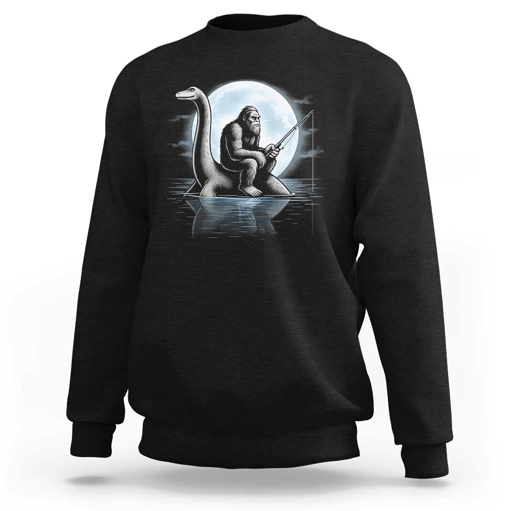 Funny Bigfoot Fishing Sweatshirt Sasquatch Riding Nessie Cryptid Moon Night - Wonder Print Shop