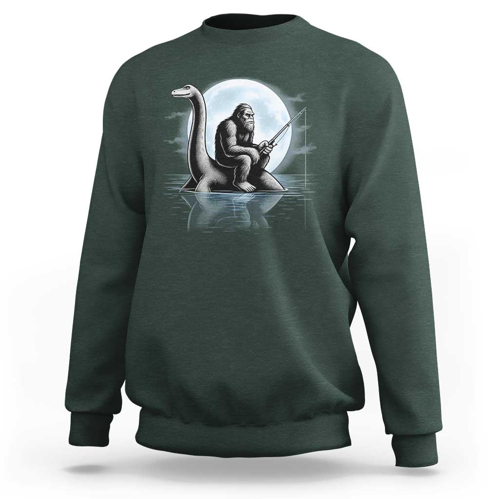 Funny Bigfoot Fishing Sweatshirt Sasquatch Riding Nessie Cryptid Moon Night - Wonder Print Shop