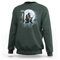 Funny Bigfoot Fishing Sweatshirt Sasquatch Riding Nessie Cryptid Moon Night - Wonder Print Shop