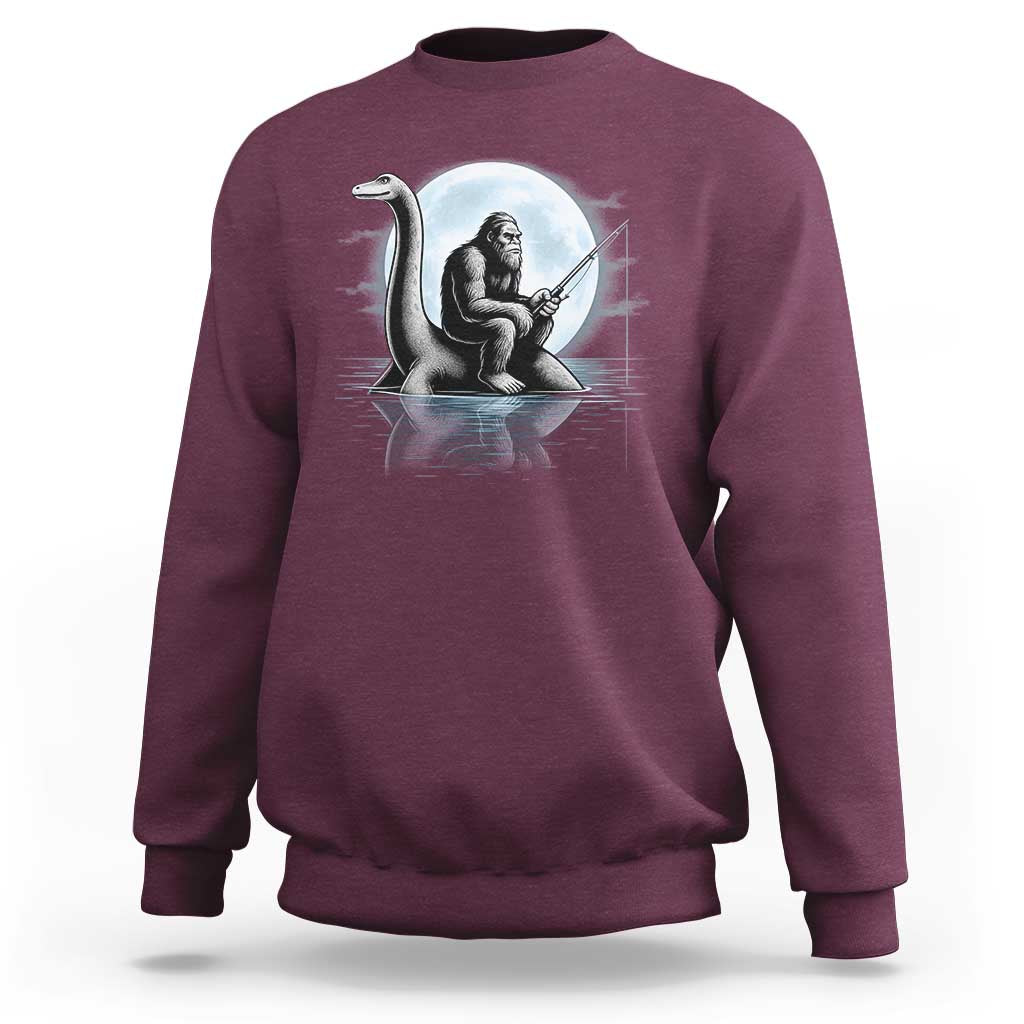 Funny Bigfoot Fishing Sweatshirt Sasquatch Riding Nessie Cryptid Moon Night - Wonder Print Shop