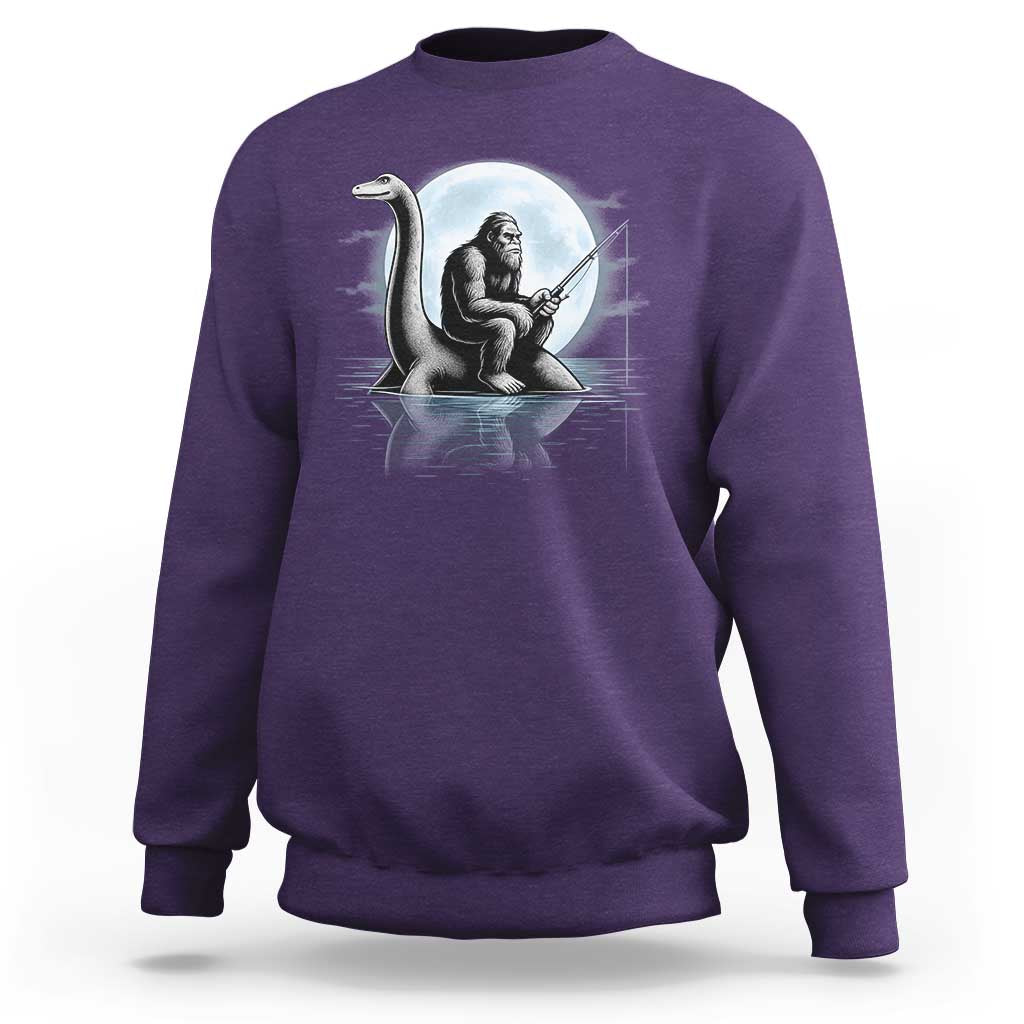 Funny Bigfoot Fishing Sweatshirt Sasquatch Riding Nessie Cryptid Moon Night - Wonder Print Shop