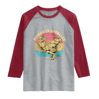 Mongo is Appalled Raglan Shirt Vintage Princess Cat Riding Dinosaur