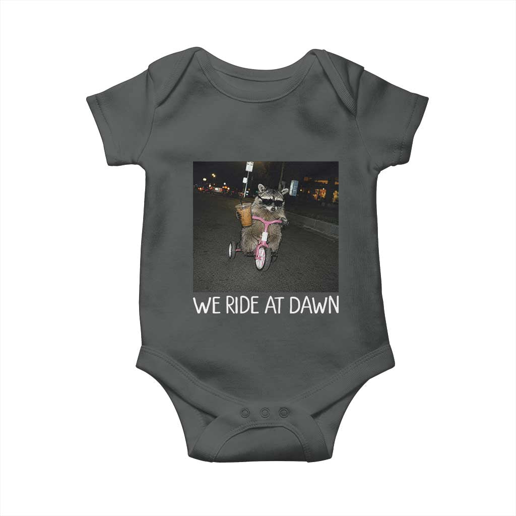 We Ride at Dawn Baby Onesie Funny Racoon Riding Tricycle Chaotic Meme