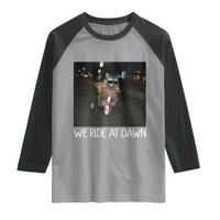 We Ride at Dawn Raglan Shirt Funny Racoon Riding Tricycle Chaotic Meme