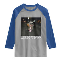 We Ride at Dawn Raglan Shirt Funny Racoon Riding Tricycle Chaotic Meme
