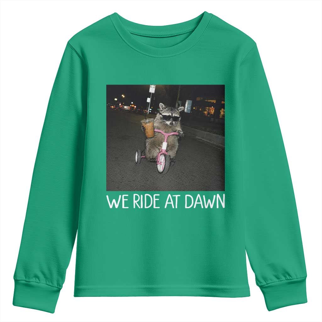We Ride at Dawn Youth Sweatshirt Funny Racoon Riding Tricycle Chaotic Meme