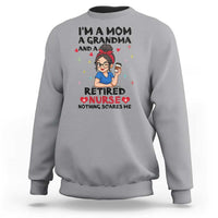 Funny Retirement Sweatshirt I Am A Mom And A Grandma And A Retired Nurse Nothing Scares Me - Wonder Print Shop
