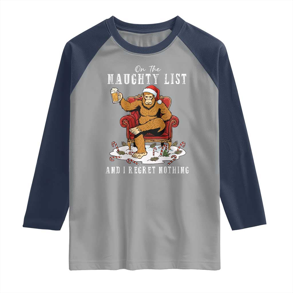 Funny Bigfoot Christmas Raglan Shirt On The Naughty List And I Regret Nothing - Wonder Print Shop