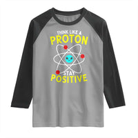 Think Like A Proton Stay Positive Raglan Shirt Funny Science - Wonder Print Shop